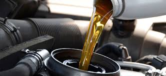 oil filling into car engine