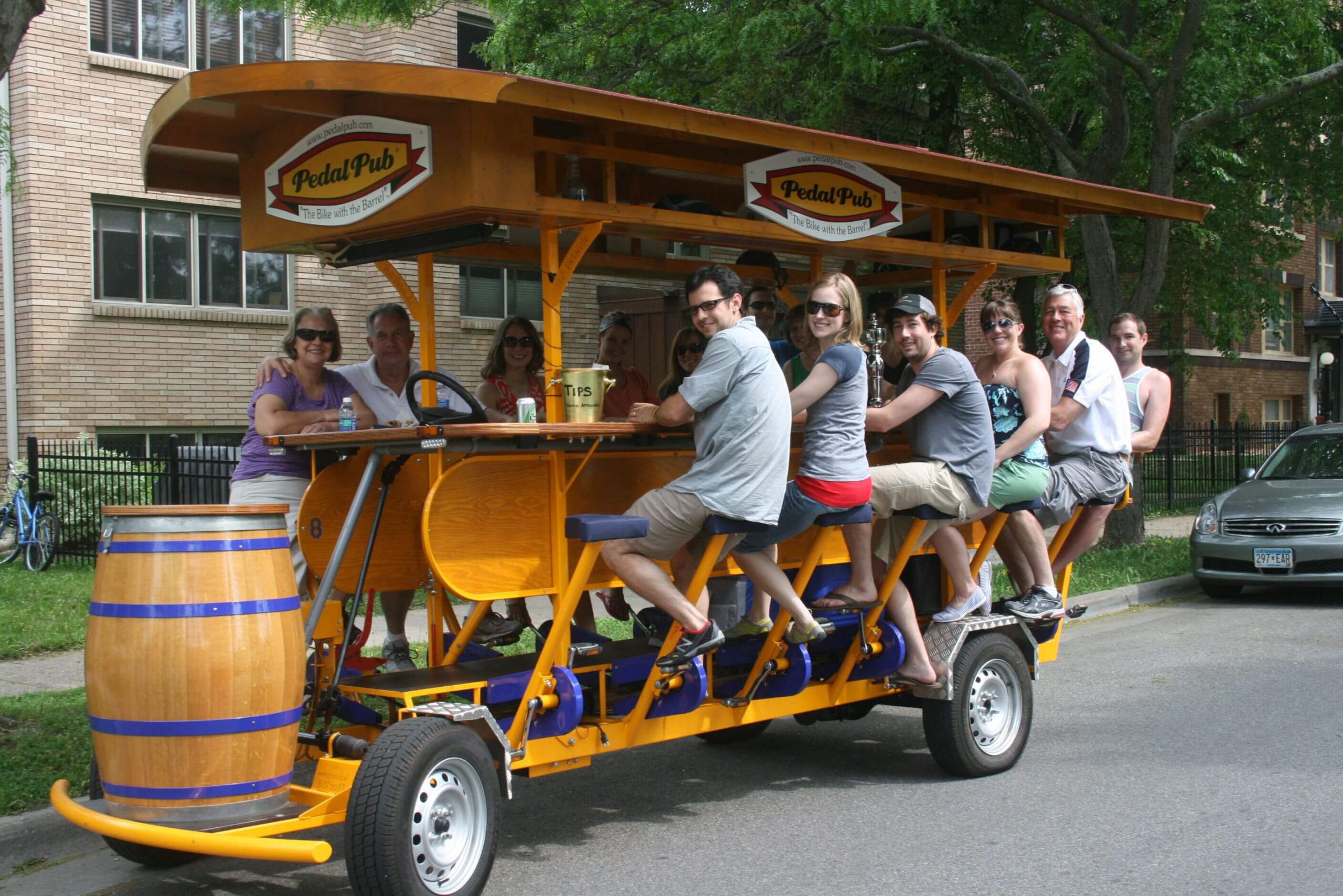 people drinking on pedalpub