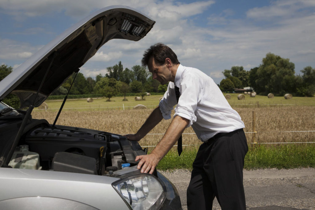 Man looking at breakdown