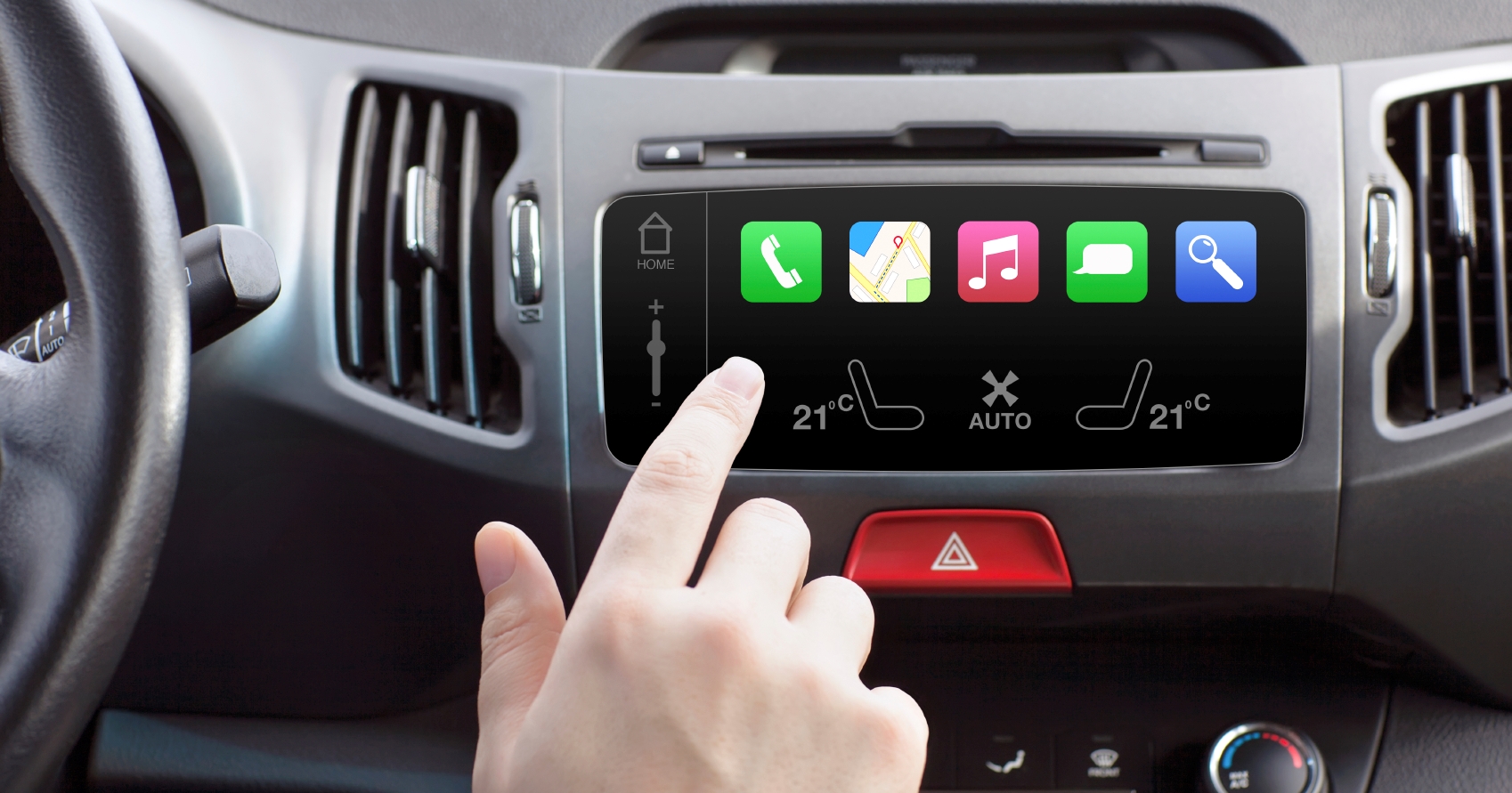 man sitting in a car and touch play finger in a auto smart system