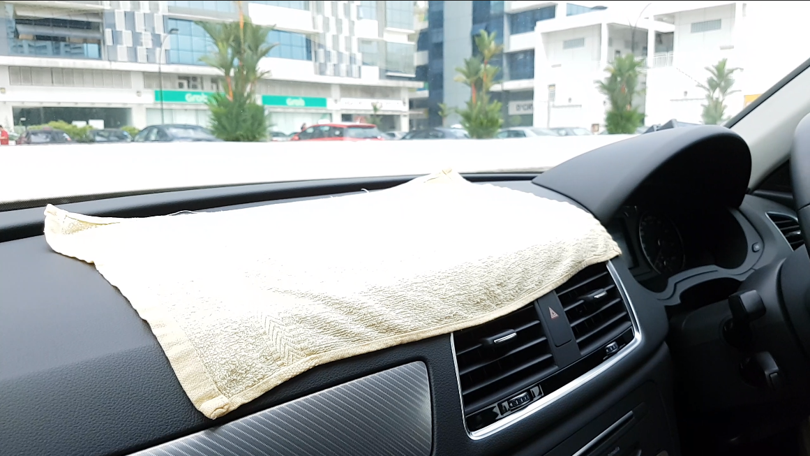 damp cloth on dashboard 