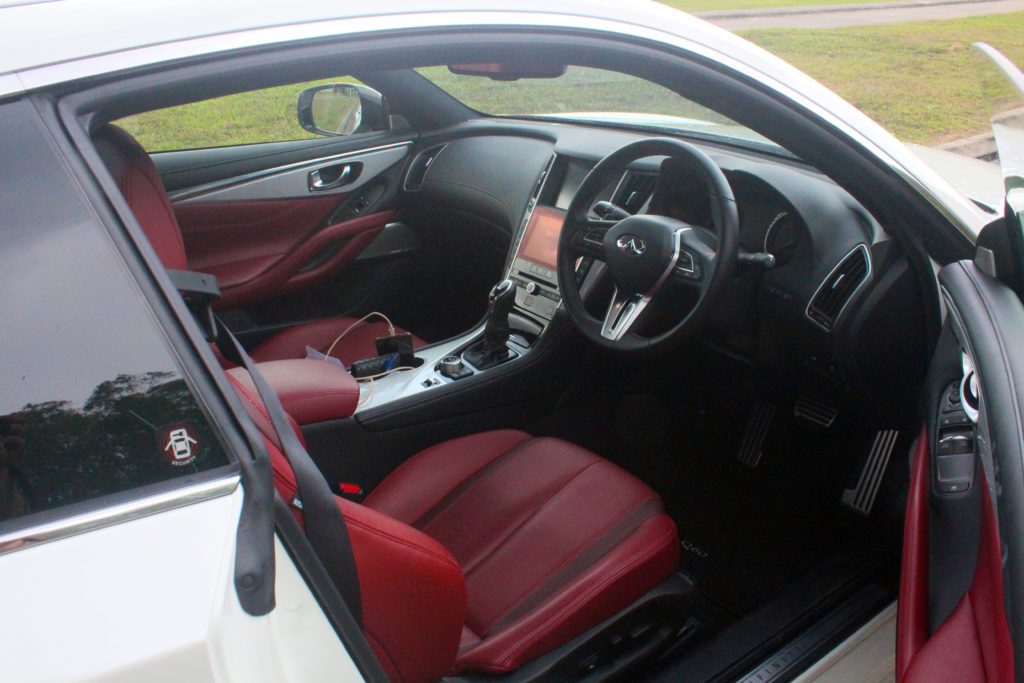 Stylish red adds some oomph in the Q60's interior design