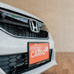 Close up view of the Honda Fit Hybrid's front grill