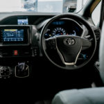Interior and dashboard of a Toyota Noah Hybrid