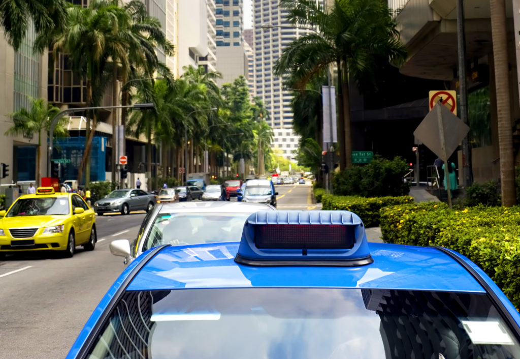 taxi on the road as a form of transport in singapore