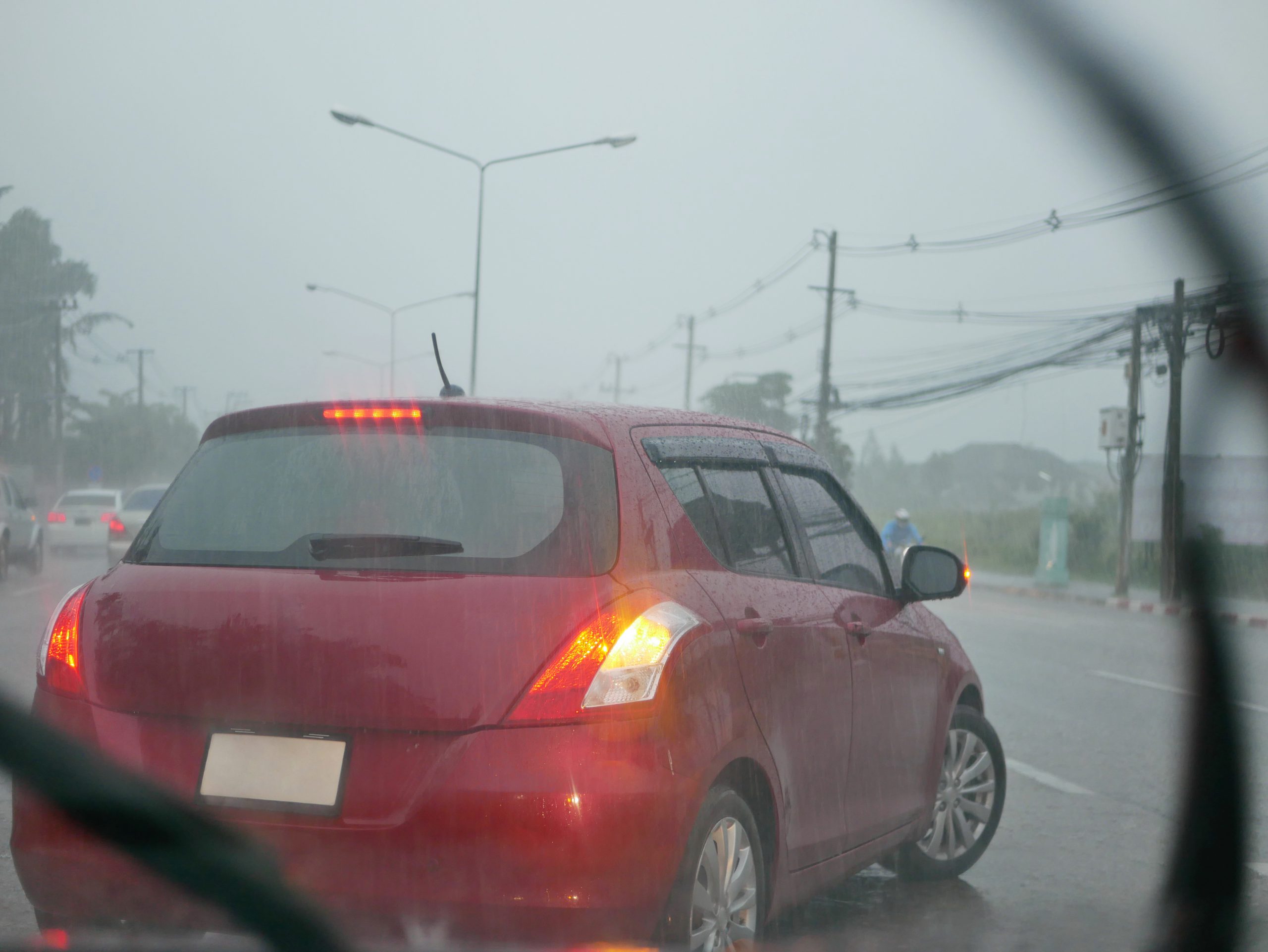 car turning in rain