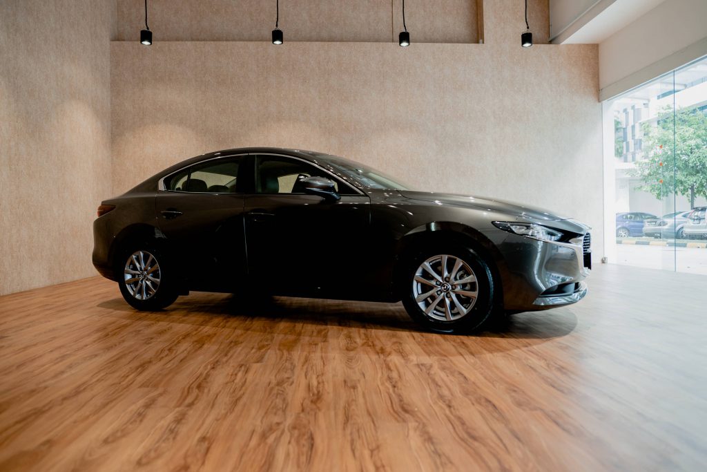 secondhand Mazda 3 in a car showroom