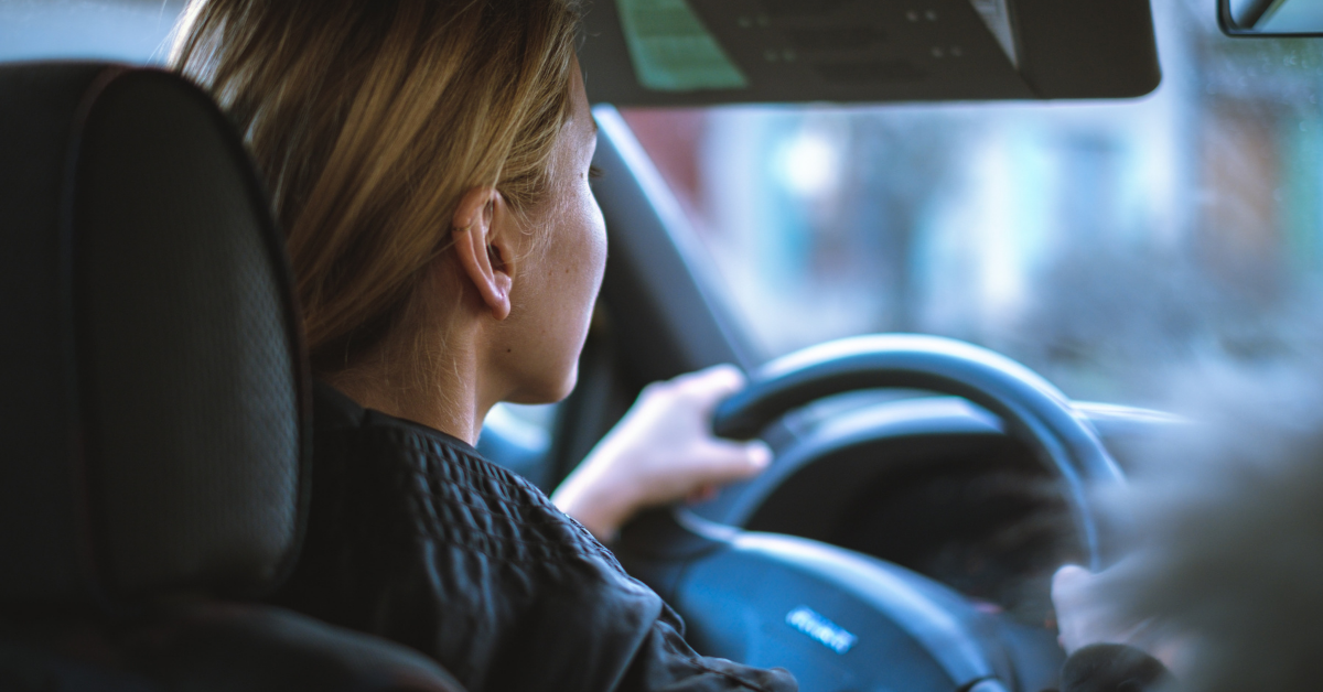 Mom in the driver's seat of the car